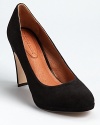 A classic from Corso Como--these timeless pumps boast soft suede and a padded insole for added comfort.