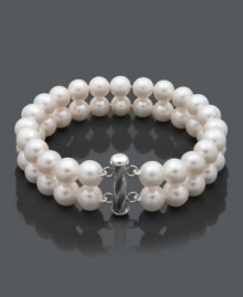 Provide your wardrobe with a timeless piece. This sophisticated bracelet features two rows of pretty cultured freshwater pearls (8-1/2-9-1/2 mm) in a sterling silver setting. Approximate length: 8 inches.