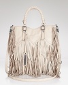 This season the basic tote has been reinvented with Sam Edelman's artfully fringed style. Crafted from leather and spaciously sized, it's instantly lends an on-trend finish to daytime outfits.