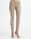 Coated with a metallic layer, these futuristic, mid-rise skinnies have a liquid-shine finish and retain an excellent stretch, making them the perfect nighttime style. THE FITMedium rise, about 8Inseam, about 30Leg opening, about 10THE DETAILSZip flyFive-pocket style78% cotton/20% polyester/2% spandexHand washMade in USAModel shown is 5'11 (178cm) wearing US size 4.