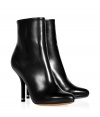 Exquisitely styled with a sleek, streamlined finish, Givenchys jet back leather ankle boots guarantee a flawless polish to your look - Softly pointed toe, hidden inside zip, stiletto heel with metal insert - Pair with minimalist separates and ultra luxe outerwear