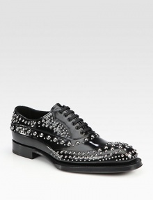 Studded lace-up design with exaggerated sole.Leather upperLeather liningWood/rubber soleMade in Italy