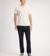 A classic straight-leg fit sits squarely on the hips with a regular rise and casual, anti-fit. A casual way to wear classic pinstripes, cut with a slimmer, slightly tapered silhouette in fabric-dyed cotton canvas chino. Button fly Side slash, back flap pockets Inseam, about 34 Cotton Machine wash Imported 