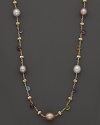 From the Paradise collection, the single stranded, multi-colored semi precious stone necklace is accented with freshwater pearls. Designed by Marco Bicego.