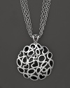 A bold sterling silver and black enamel pendant featuring a cluster of hearts on a triple-chain necklace. From Fifth Season by Roberto Coin.