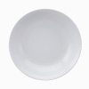 Modern in design with a raised circular pattern, made from French Limoges Porcelain. Dishwasher and microwave safe.