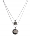 Dual nature: Round and concave pendants come together in this chic two-row necklace from Kenneth Cole New York. Set in hematite tone mixed metal. Approximate length: 16 inches + 3-inch extender. Approximate drop: 1/2 inch (small pendant), 3/4 inch (large pendant).