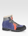 Rich suede with printed suede, leather and fur trims. Rubber sole Water repellent Made in Italy 