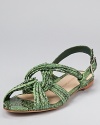 Loeffler Randall's prized Filippa sandal feels fresh season after season. Reimagined in a covetable green snake print, this is one silhouette we'll never get enough of.