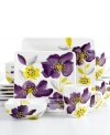 A bouquet of color from Laurie Gates, the Anna Lily dinnerware set blooms in rich violet and bright, sunny yellow. Hand-painted blossoms take root in square earthenware plates and bowls while the accompanying mugs feature a curved design for comfortable cupping.