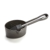 Slathering on sauce couldn't be easier with this heavy-duty cast iron sauce pot, featuring even heat distribution plus a hollowed-out handle where the basting brush nests.