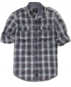 Roll up your sleeves and greet the weekend in this can't-miss plaid shirt from Calvin Klein