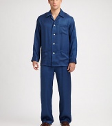 A subtle shadow stripe adds definition and a clean finish to a traditional pajama set, woven from luxurious silk for a fit and feel of superior softness. Silk. Hand wash. Imported.SHIRTButton-frontChest, waist patch pocketsPANTSSide elastic waistbandInseam, about 31