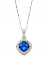 Evening-ready and perfect for an elegant affair, Eliot Danori's stunning pendant highlights a diamond-cut blue glass center highlighted by a halo of sparkling clear crystals. Crafted in silver tone mixed metal. Approximate length: 16 inches + 2-inch extender. Approximate drop: 1 inch.