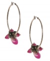 Exotically appealing. Lucky Brand's whimsical orchid hoops will whisk you away to a tropical place. Set in mixed metal with pink enamel accents. Approximate diameter: 1-3/4 inches.