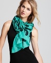 A key piece for the season, DIANE von FURSTENBERG's heart-and-keyhole-printed scarf is fashioned in a vibrant jade.