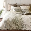 Palm frond flutter against the devet set in colors of white, ivory, pebble, sand, inviting you to sink back into laid-back luxury. The trendy tonal engineered print on 300 thread count cotton sateen creates one continuous leaf across two shams. Duvet and shams are finished in self fabric micro-flange, and reverse to solid pebble.