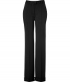 Luxurious pants made ​.​.from fine black wool - New elegant silhouette with slightly flared legs - Creases, short waistband and belt loops, side pockets - A classic AND fashionable look that works great for the office - Looks grown up, professional and dressed up - A terrific basic to wear with blouses, tops, cardigans