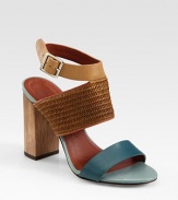 Trend-forward colorblocking and textured raffia enhance this smooth leather essential. Wooden heel, 3½ (90mm)Raffia and leather upperLeather lining and solePadded insoleImportedOUR FIT MODEL RECOMMENDS ordering true size. 