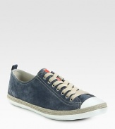 Classic lace-up design in soft suede leather.Leather upperLeather liningRubber soleImported