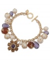 Charm your friends with this bracelet from Carolee. Features clusters of colorful epoxy stones and glass accents. Crafted in 12k gold-plated mixed metal with a toggle closure. Approximate length: 7-3/4 inches.