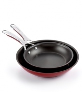 Cook with confidence-always have a bold approach to prep and cooking with the statement red of these professional skillets. Porcelain enamel exteriors with a heavy-gauge constructions aide in fast heat-up and eliminate hot spots that can burn food. Food slides right off the nonstick interiors, which are exceptionally long-lasting and durable, so you can spend less time at the sink and more time cooking up masterpiece creations. Limited lifetime warranty.