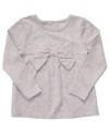 Charming oversized bow accents this lovely solid top by Carter's.