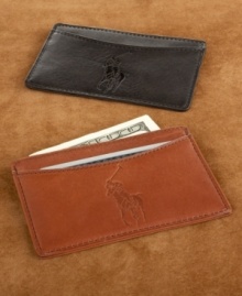 Get back to basics. Trade in your bulky billfold for this slim leather card case, featuring three card slots, plus an additional cut away slot on opposite side. With embossed logo. Imported.