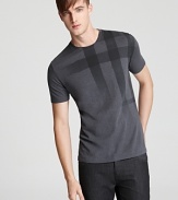 Burberry Brit sets the tone with a clever tee rendered with a faded tonal check pattern for iconic style.