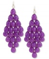 Perfectly pretty in purple. These chandelier earrings from Haskell flaunt a diamond design with clusters of purple acrylic beads in faceted teardrop shapes. Crafted in gold tone mixed metal. Approximate drop: 3-3/4 inches.