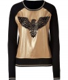 With a futuristic hammered silk front and glam embellished eagle, Juicy Coutures wool pullover is a chic way to add a rocknroll edge to your outfit - Round neckline, metallic trim, long sleeves, metallic trimmed cuffs, fine ribbed trim - Loosely fitted - Wear with leather leggings and shearling lined boots