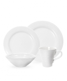 The pristine porcelain of this place settings collection lends your tabletop a clean, modern sensibility, while the textured pattern adds hand-thrown appeal.