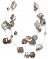 Whimsical and warm weather-ready! Featuring a shell motif, Style&co.'s illusion necklace is a chic choice for relaxed summer style. Adorned with iridescent plastic beads, it's set in silver tone mixed metal. Approximate length: 18 inches + 2-inch extender. Approximate drop: 3-1/2 inches.