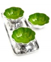 More than conversation blossoms around your table with handcrafted Lemongrass Lotus nut bowls from Simply Designz. Polished aluminum lined in glossy enamel lends fresh color and shine to any dining area. With tray.