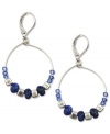 String together your perfect look with Jones New York. These darling hoops pop with blue and silver semi-precious and metal beads. Crafted in worn silver tone mixed metal. Approximate drop: 1-1/2 inches. Approximate diameter: 1 inch.