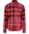 Effortless and iconic with its oversized check, Burberry Brits classic cotton button-down lends a characteristic cool edge to every outfit - Small pointed collar, long sleeves, buttoned cuffs, button-down front, shirttail hemline - Straight silhouette - Wear with everything from jeans and sneakers to tailored trousers and Chelsea boots