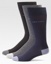 Lightweight and breathable solid dress socks with logo detail and heel and toe contrast, finished in a smooth, stretch cotton blend.Set of 3Mid-calf height75% cotton/23% polyesteramide/2% elastaneMachine washImported