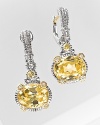 Oval Loopty Loo canary crystal earrings in sterling silver with 18 Kt. gold accents. Designed by Judith Ripka.