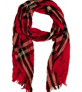 A modern take on the classic tartan scarf, this urbane-cool accessory provides warmth and effortless style - Classic tartan print, easy to style length, frayed edges - Style with a cashmere pullover, skinny jeans, a sleek parka, and ankle boots