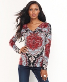 An intricate print spices up a classic cowlneck top from INC. Bold color gives this look a rich, exotic feel.