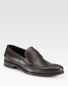 Slip-on leather loafer with embroidered signature logo detail.Leather upperPadded insoleLeather soleMade in Italy