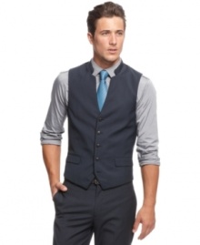 Complete the look of sophisticated man-of-style with this vest from INC International Concepts.