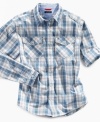 For the perfect sunny day look, he can throw on this crisp plaid shirt from Tommy Hilfiger.