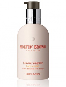 Our Heavenly Gingerlily Body Cream is a true original product in every way, using the finest essential oils and active extracts, it bring the flavors and aromas of the Polynesian islands to life. The indulgent body lotion will leave your skin not only feeling hydrated and moisturized, but mica extract leaves the skin with a sheen of shimmer which is visible after application. Perfect for holiday or going out. Made in England. 6.6 oz.