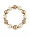 Shift into neutral: Taupe and golden brown imitation pearls (12 mm) make Charter Club's stretch bracelet a practical, easy to mix-and-match part of your jewelry collection. Crafted in gold tone mixed metal. Approximate diameter: 2 inches.