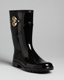 These abbreviated Love Moschino rain boots are right in step with the latest, wet-weather trend: glossy rubber punctuated with bold, gold hardware.