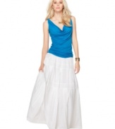 Calvin Klein Jeans softens up a classic cotton maxi skirt with bands of eyelet and embroidered trim.