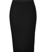 An exquisite choice for business to cocktails looks, Donna Karans stretch wool pencil skirt cuts a flattering feminine figure no matter how you wear it - Black elasticized grosgrain waistband, contoured seaming, hidden back zip, pleated back hemline - Form-fitting - Team with feminine tops and standout statement accessories