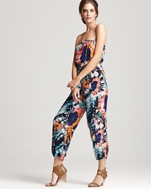 In an abstract floral print, this Plenty by Tracy Reese strapless jumpsuit puts a modern spin on the one-piece, featuring tapered legs and elasticized cuffs for an edgy, downtown look.