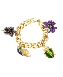 Chic creatures. RACHEL Rachel Roy celebrates the wonders of nature with this whimsically stylish critter-themed charm bracelet. Embellished with porcupine, bird, beetle and flower charms, it's crafted in gold tone mixed metal with sparkling crystals. Approximate length: 7-1/2 inches.